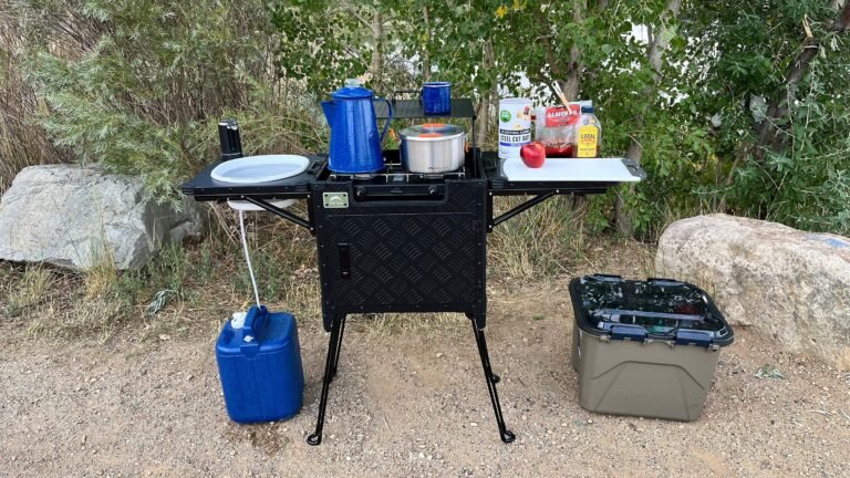 A Standing-Height Camp Kitchen With Running Water